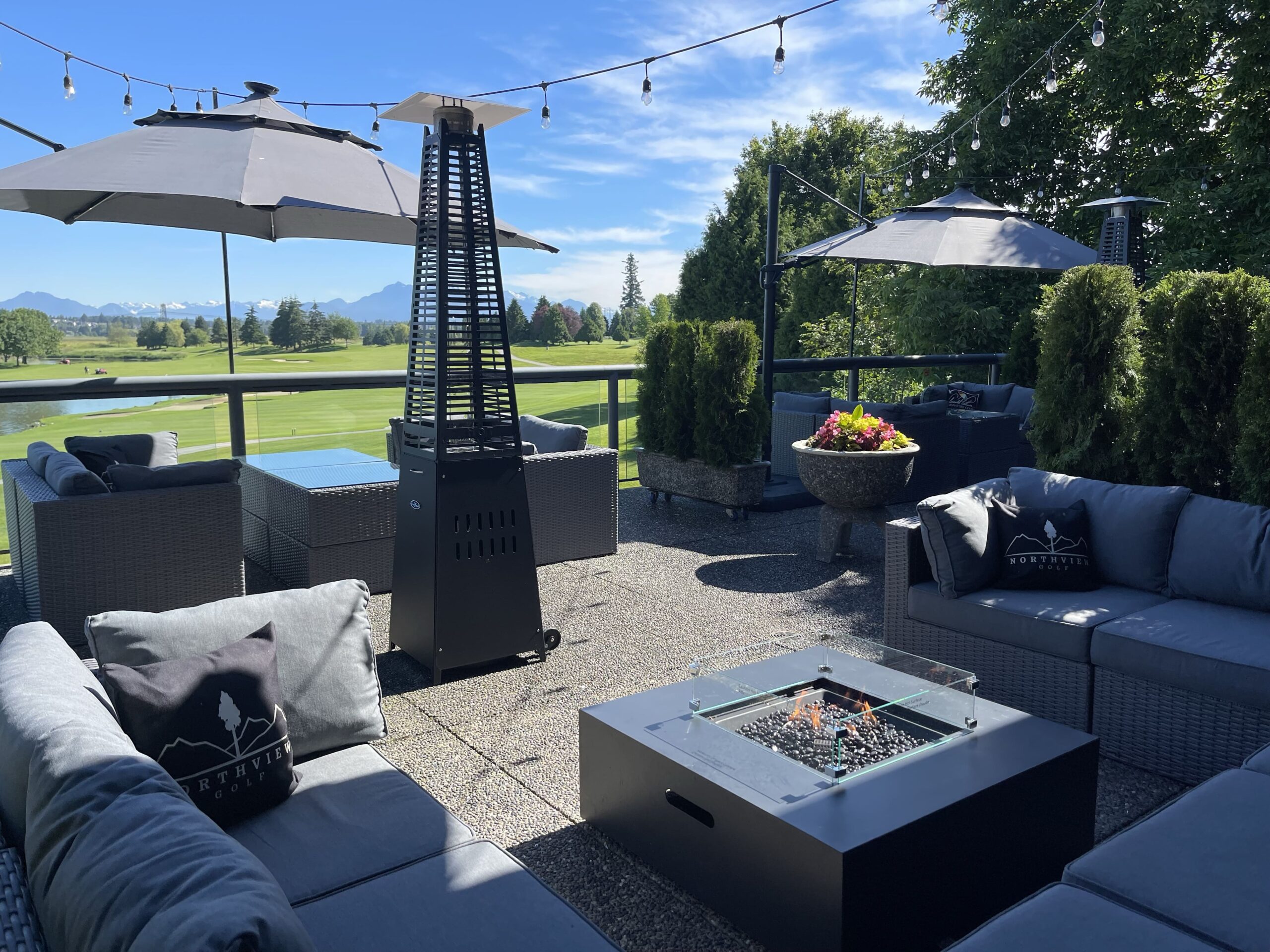 View of Northview Golf's clubhouse patio on a sunny day