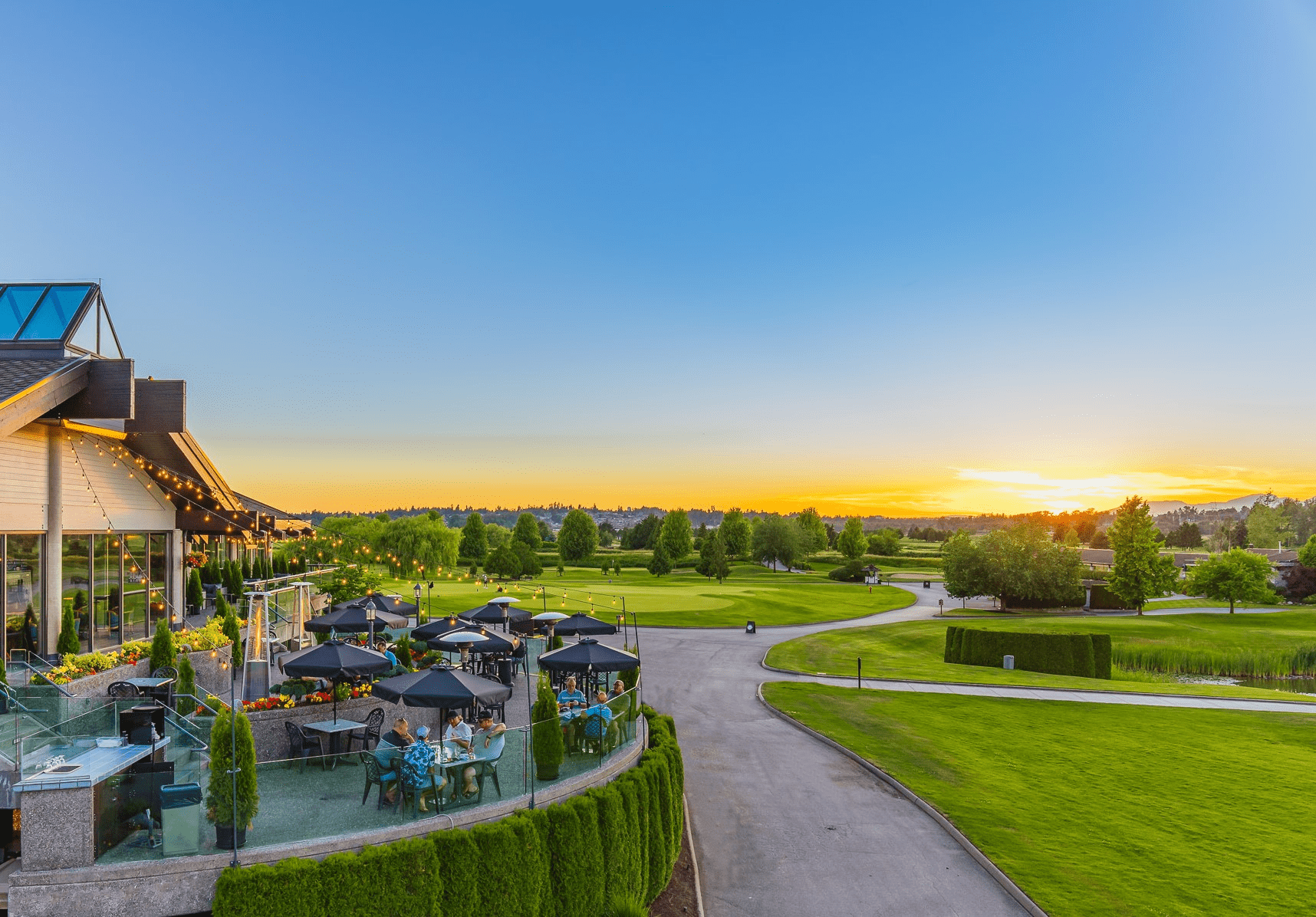 Landscape view of Duffey's Sports Grill patio at dusk
