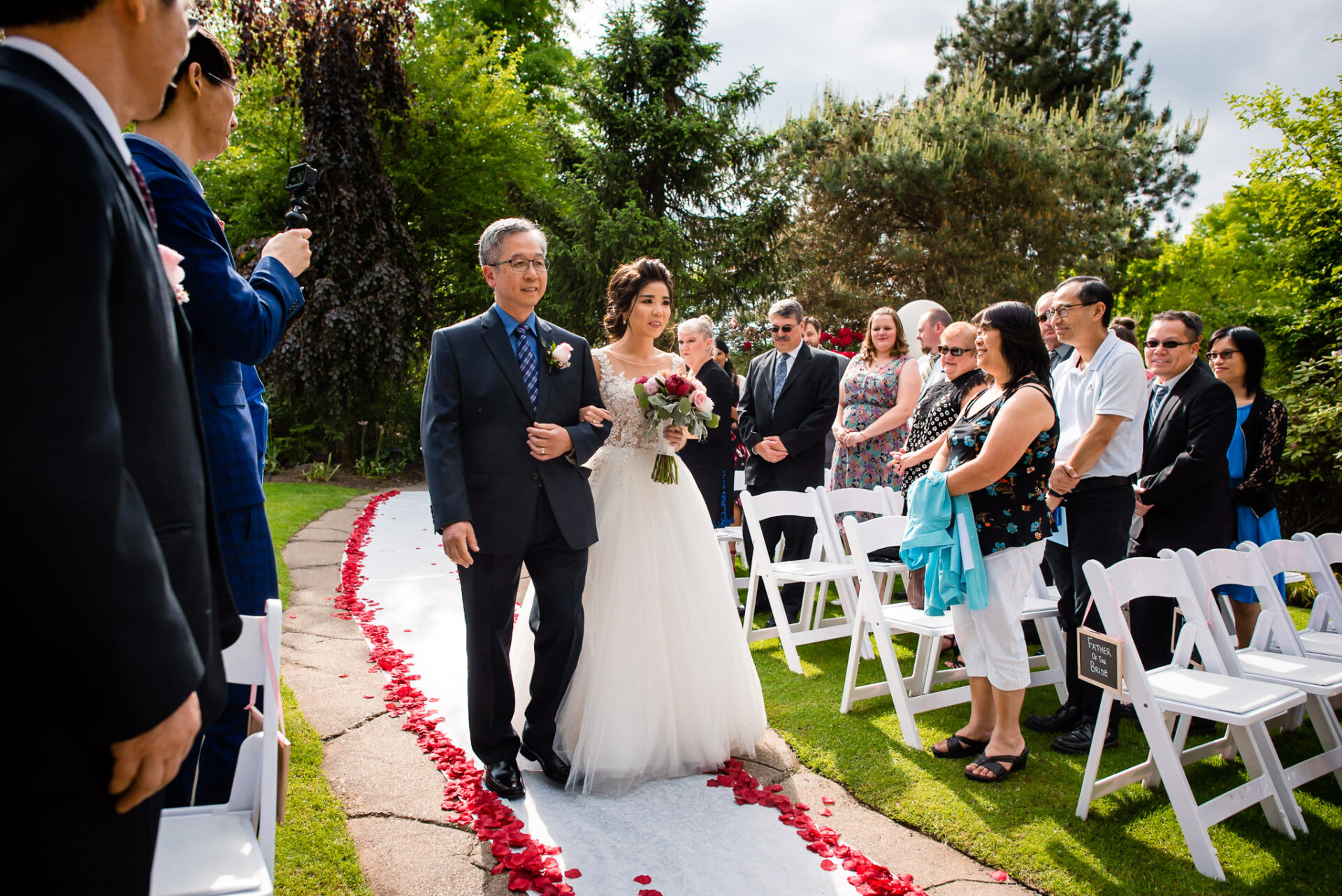 Bride and her father walking down the aisle