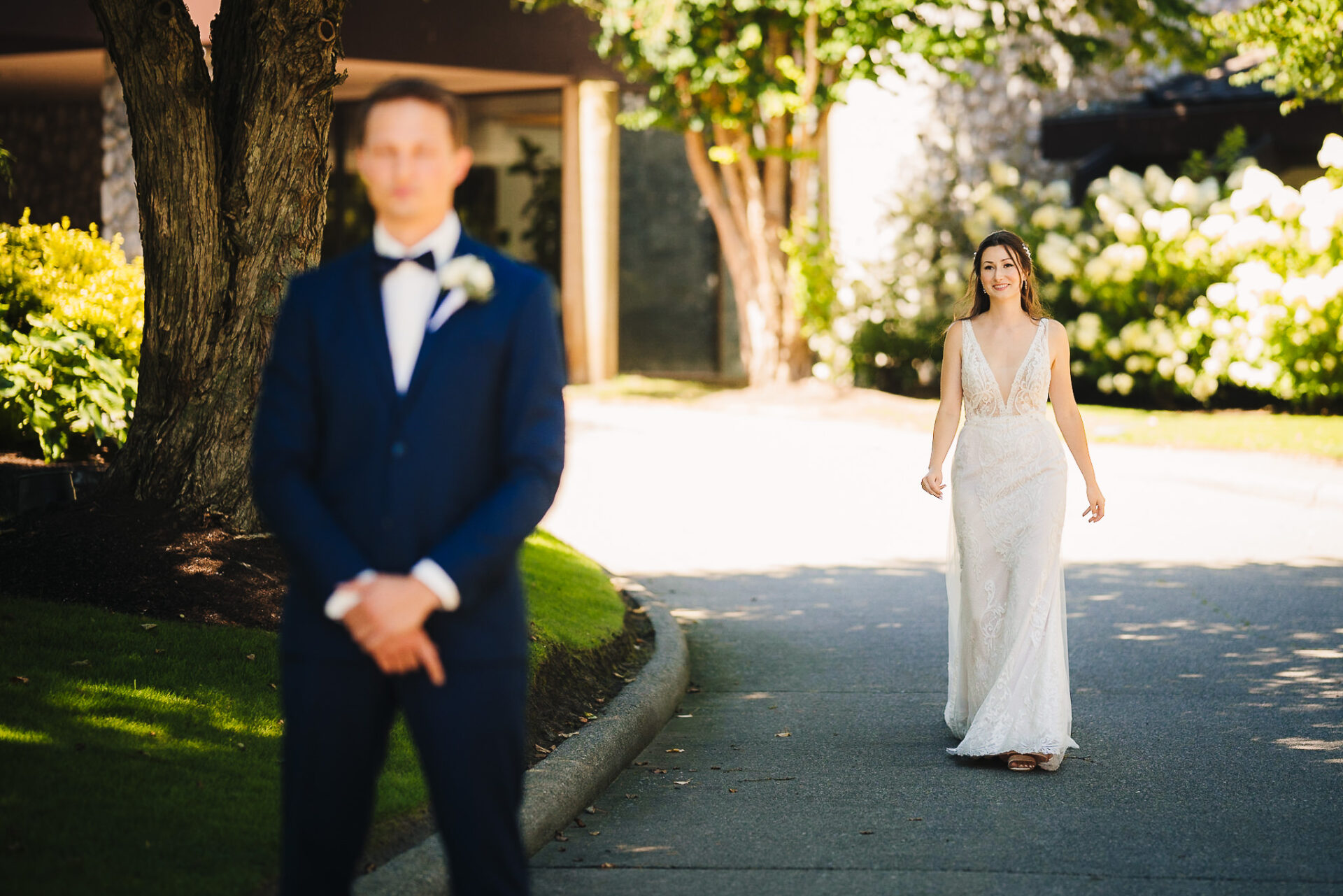Bride approaching the groom from behind
