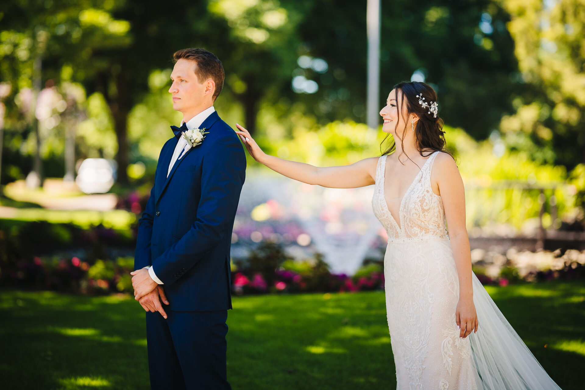 Bride tapping the groom's shoulder from behind