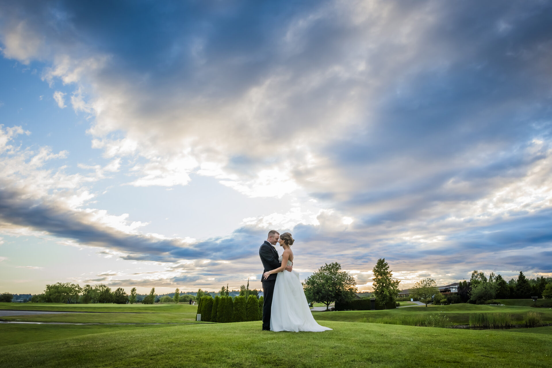 Bride and groom embracing each other
