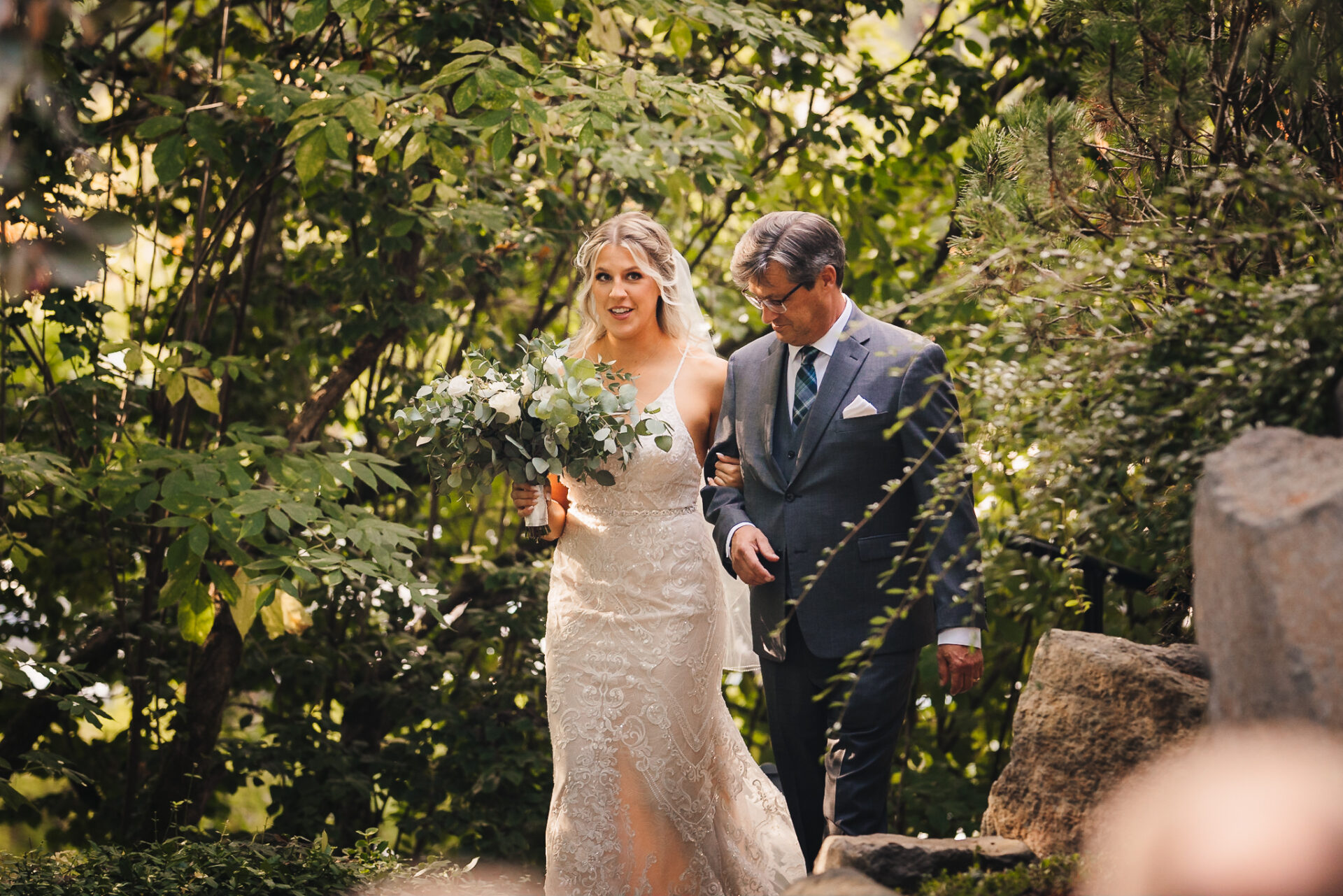 Bride and her father walking together