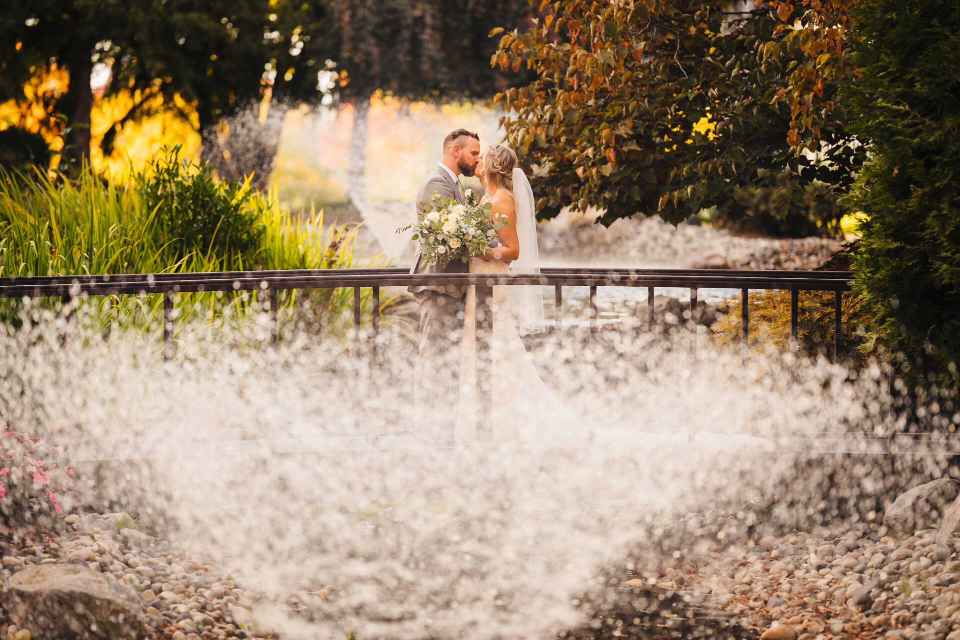 Bride and groom share a kiss