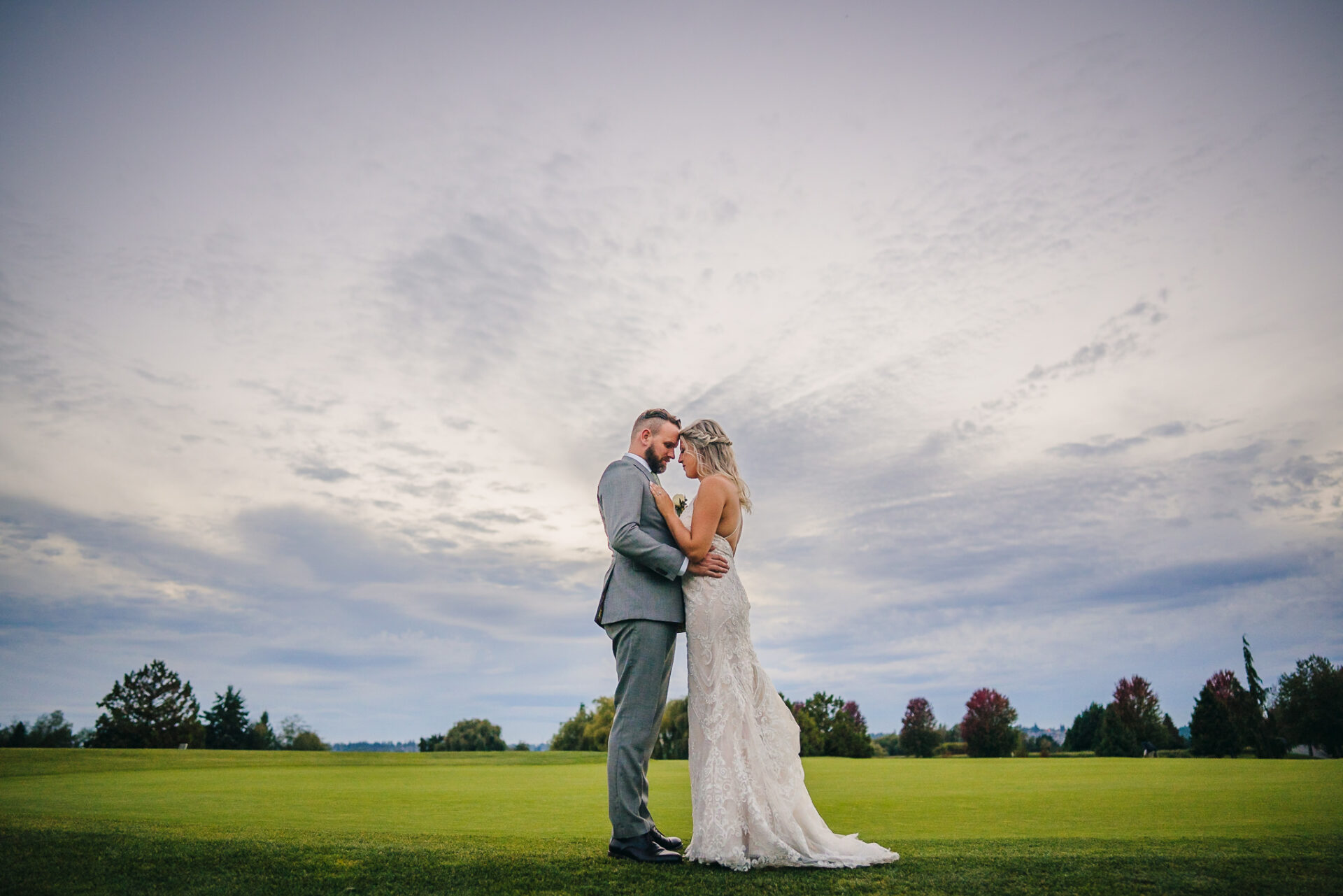 Bride and groom embracing each other