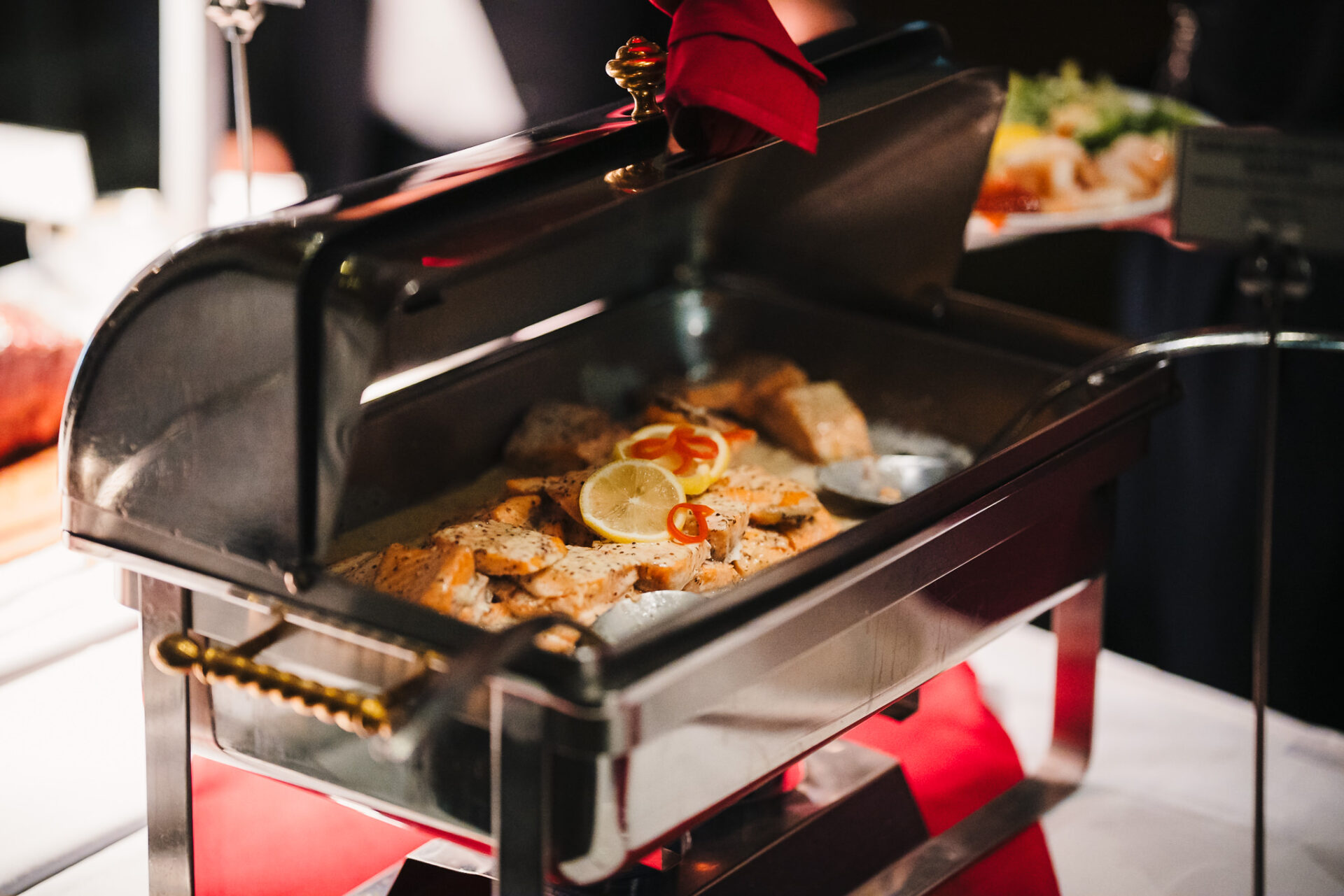 Close up of a cooker with cooked salmon inside