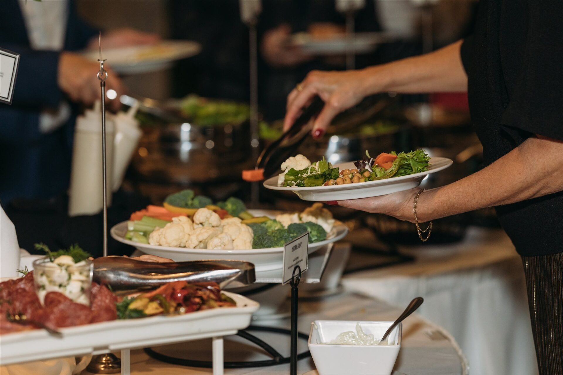 Wedding guest serving themselves some food