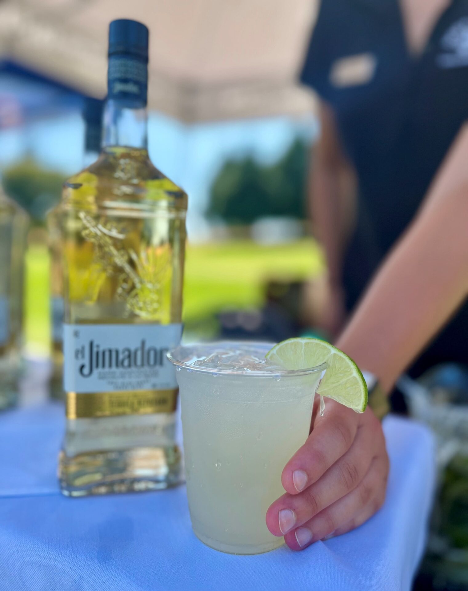 Close up of someone holding a cocktail 