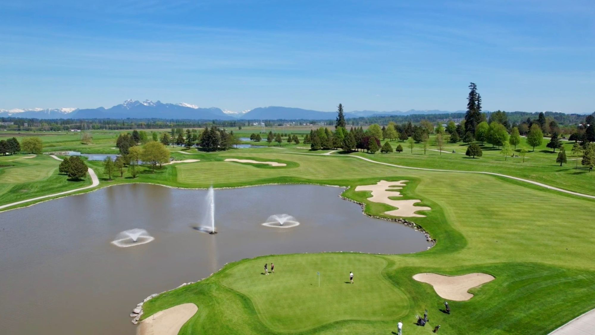 View of one of the courses with the beautiful mountains in the background